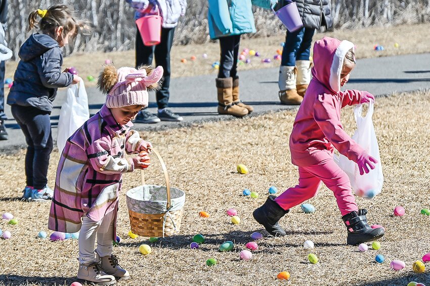 Kids make a bee-line for   Easter eggs in Ely.