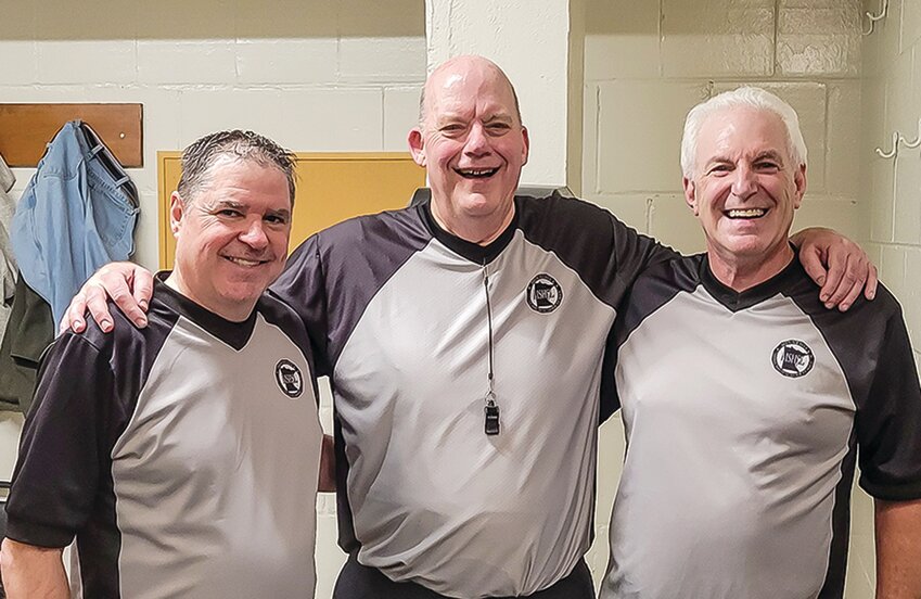 Paul McDonald&rsquo;s referee  team at his last basketball game, the Section 7A semi-final   game between Carlton/Wrenshall and Mt. Iron-Buhl. Left-to-right: Frank Ivancich, Paul McDonald, Dave Clement