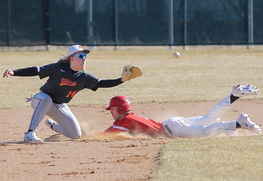 Ely&rsquo;s Caid Chittum slides in safe at second during Monday&rsquo;s home tilt with Littlefork.