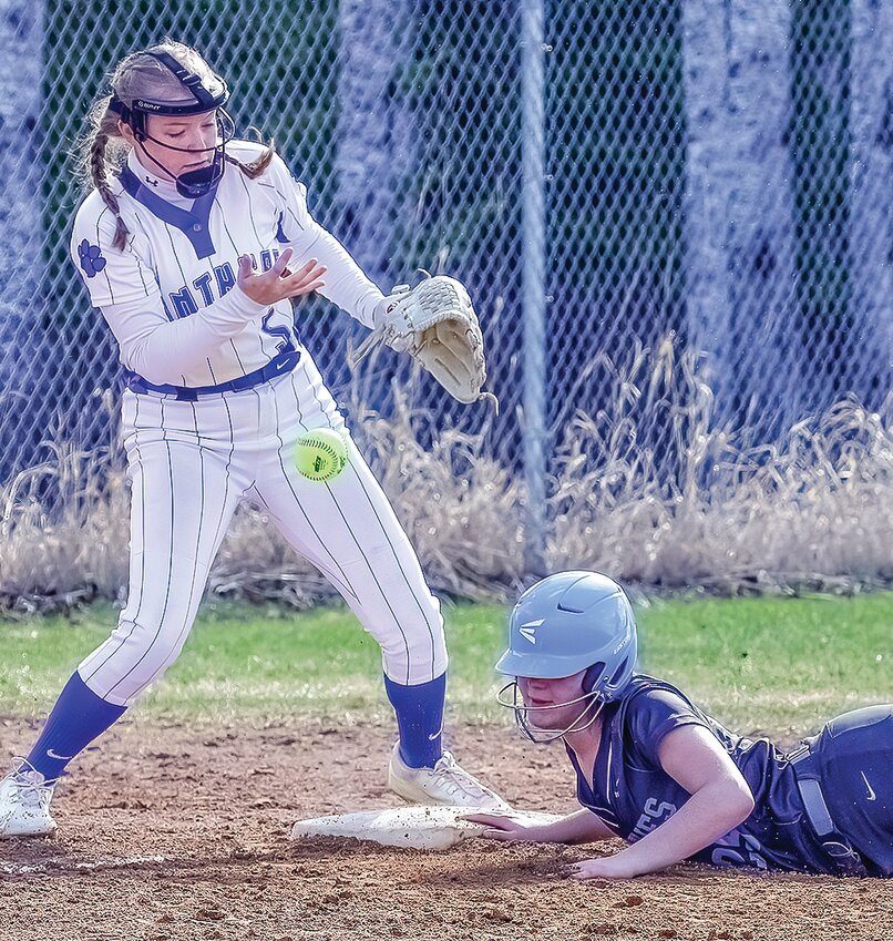 The Grizzlies&rsquo; River Cheney slides in safe at third after hitting a triple during last Friday&rsquo;s    contest with South Ridge.