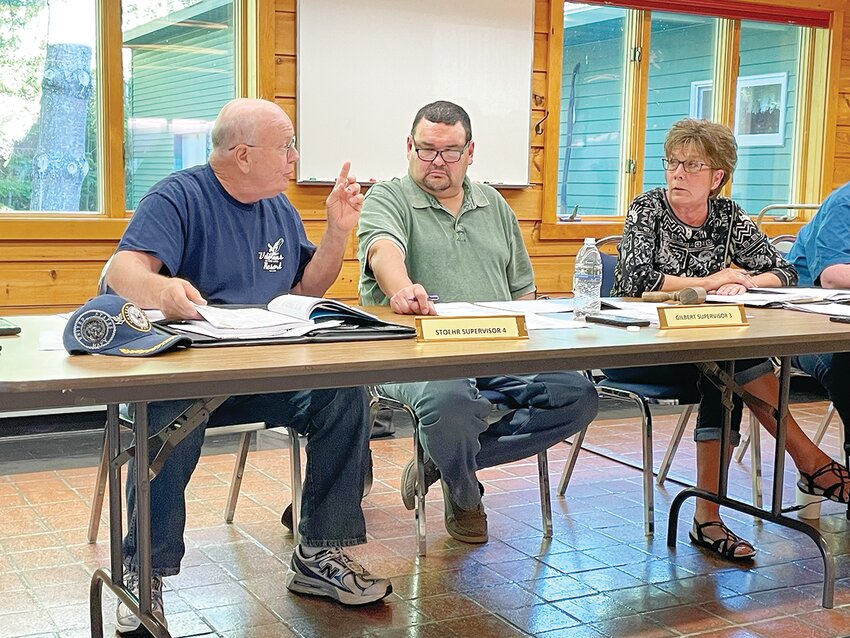 Supervisor Rick Stoehr sparred with other town board members   several times during the meeting. From left: Stoehr, Craig Gilbert,   and Lois Roskoski.