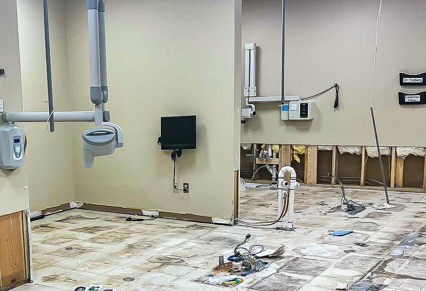 Extensive wall and floor damage at Scenic Rivers Dental Clinic will be covered by flood insurance,   but costly medical equipment and other contents of the   building will not.