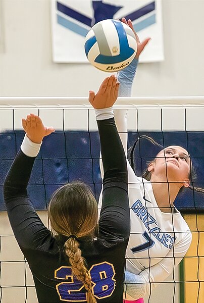 The Grizzlies&rsquo; Izzy Pascuzzi hammers a kill against Fond du Lac on Tuesday.