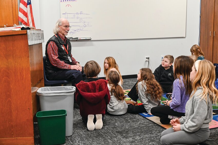 Music teacher Mike Rouse teaching an operatic chorus from the Dvor&aacute;k opera, &ldquo;Rusalka,&rdquo; to Megan Wognum&rsquo;s second-grade class