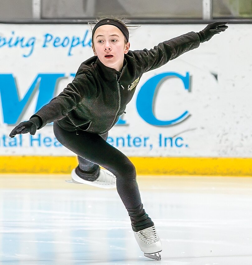 Stella Pliml executes a   graceful move on the ice at the Iron Trail Motors Event Center in Virginia