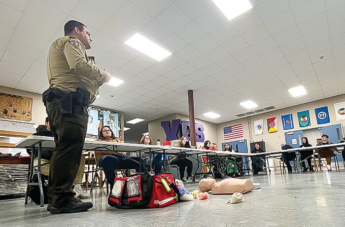 Breitung Police Chief Dan Reing teaches a CPR class to students at Vermilion Country School.