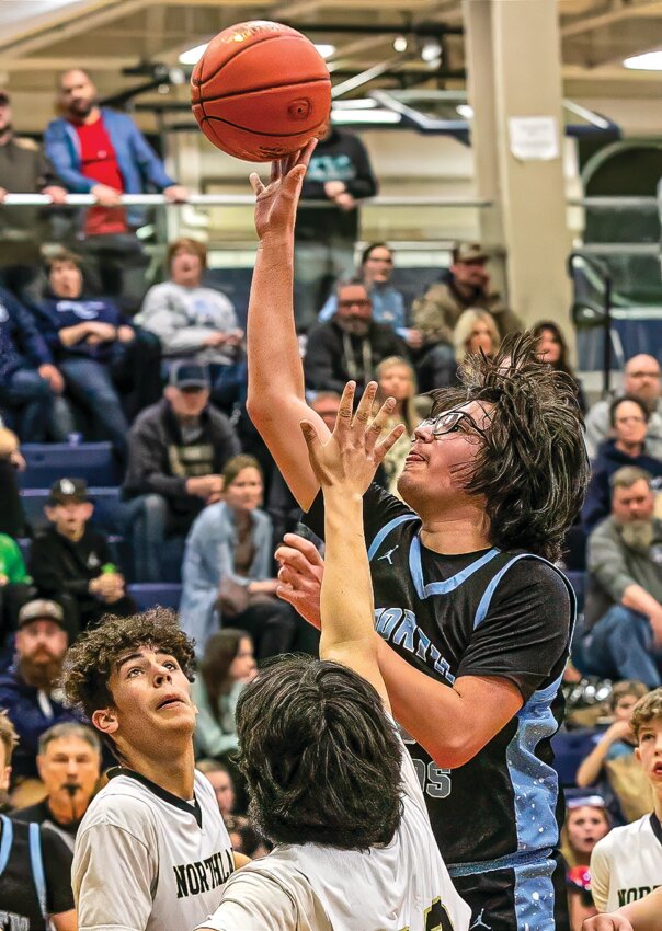 The Grizzlies&rsquo; Scott Morrison releases a soft jumper in the lane against Northland last Wednesday in the first round of tournament action.