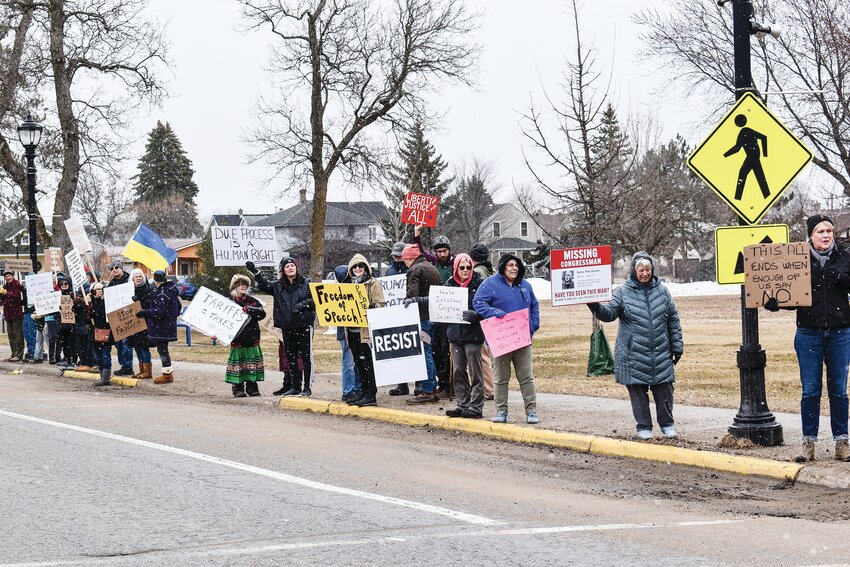 Protestors in Ely picket against Trump administration policies.