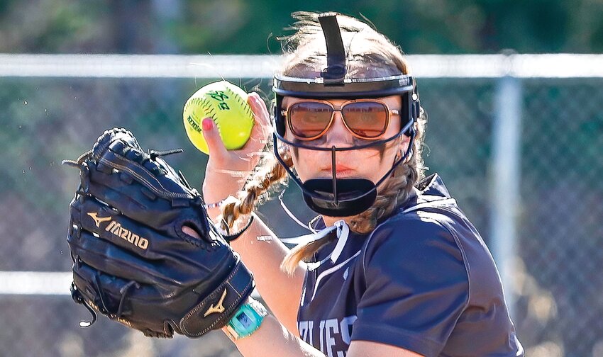 North Woods   shortstop Emarie Gibson preps for a throw to first base against Deer River on Tuesday.