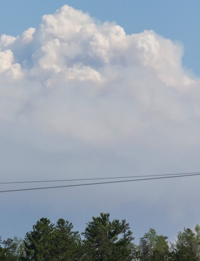 A massive smoke   column from the Jenkins Creek Fire as viewed from Tower on Tuesday afternoon. The fire, combined with the nearby Camp House Fire, had scorched more than 35,000 acres as of Wednesday   morning.
