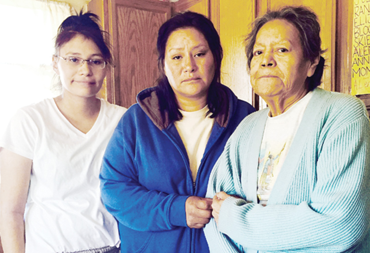 Edith Chavez, center, with daughter, Alena, and mother, Jackie, at home on the Vermilion Reservation, just days after her abduction ordeal in North Dakota.