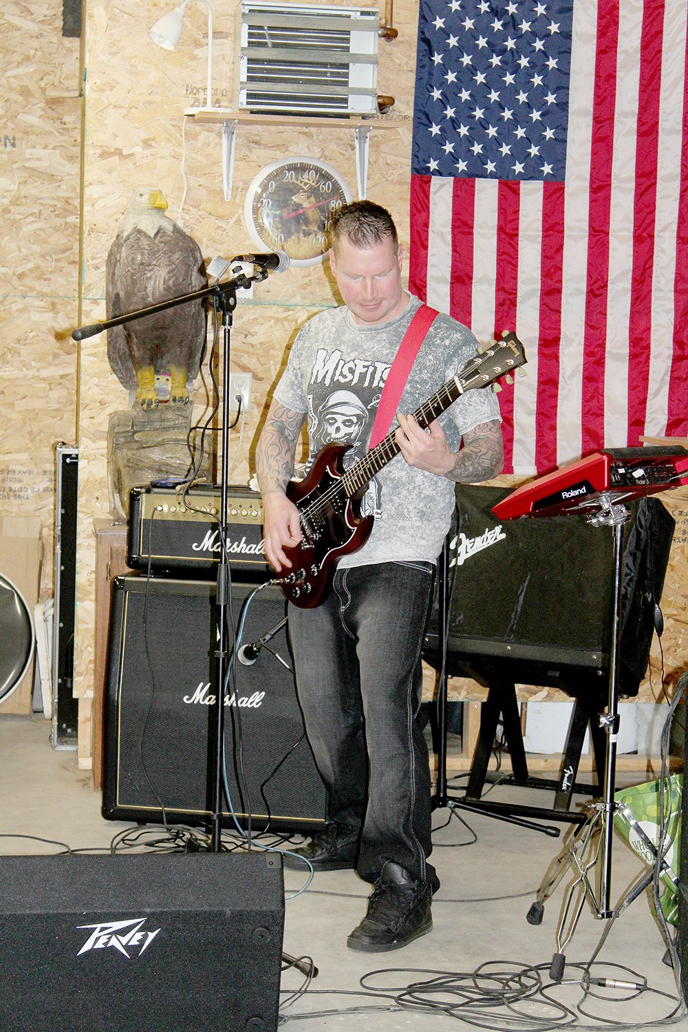 Chaz Wagner of War Bonnet plays rhythm guitar during a rehearsal on Sunday, Aug. 4 in Cook.