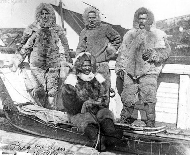 Members of Robert Peary’s polar exploration team and the original dogsled are shown in this 1909 photograph. A crew will be in Ely next week filming a historical documentary on the trek.