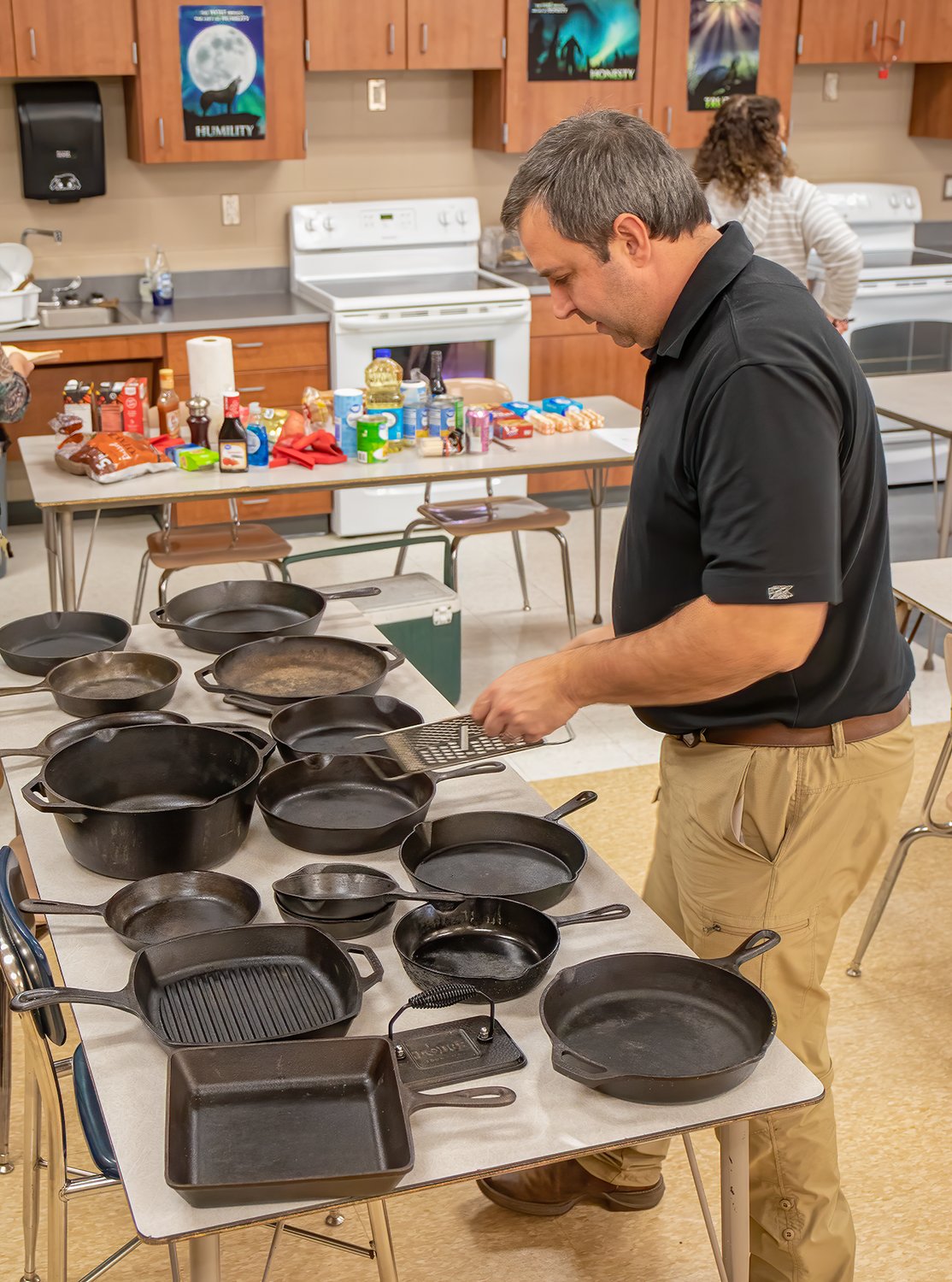 Steve Kajala prepares a sample of his cast iron cookware collection prior to his cooking class.