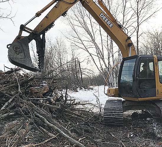 A backhoe operator was on the site of the Rose RV park last week.  Tree clearing and road work is underway.