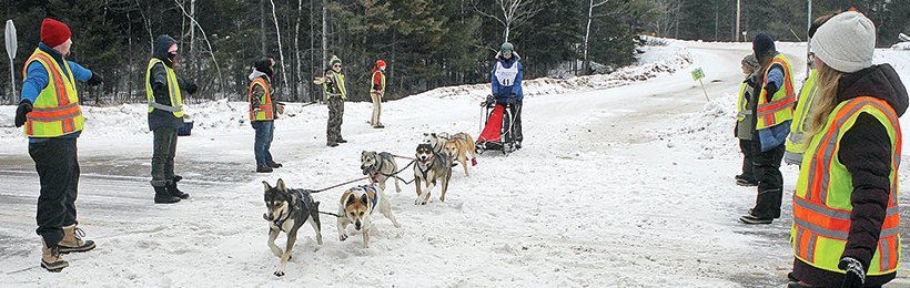 Volunteers kept Highway 21 open for mushers as they headed to Bear Head Lake State Park.