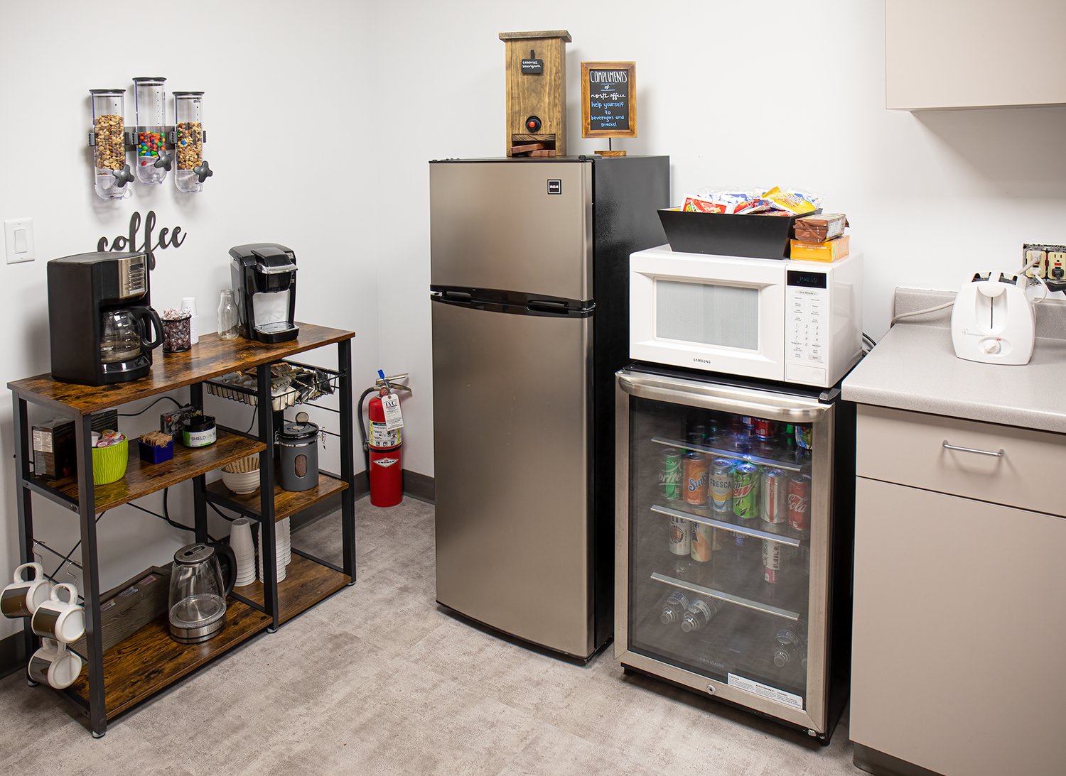 The kitchenette at North Office includes complementary soft drinks, coffee and tea for customers.