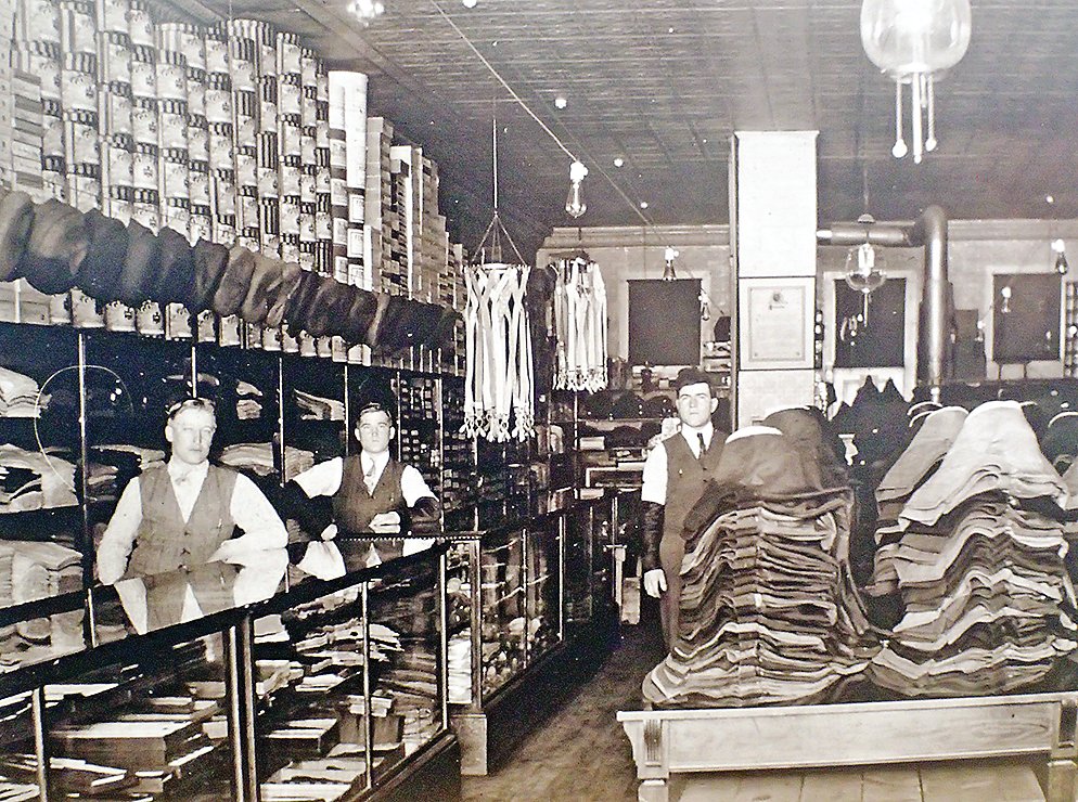 J.D. Mills Company, at it’s original location in the early 1900s. Original owner, Abe Bloomenson is shown at the right. John Mills’ grandfather, William Mills is shown in the middle.