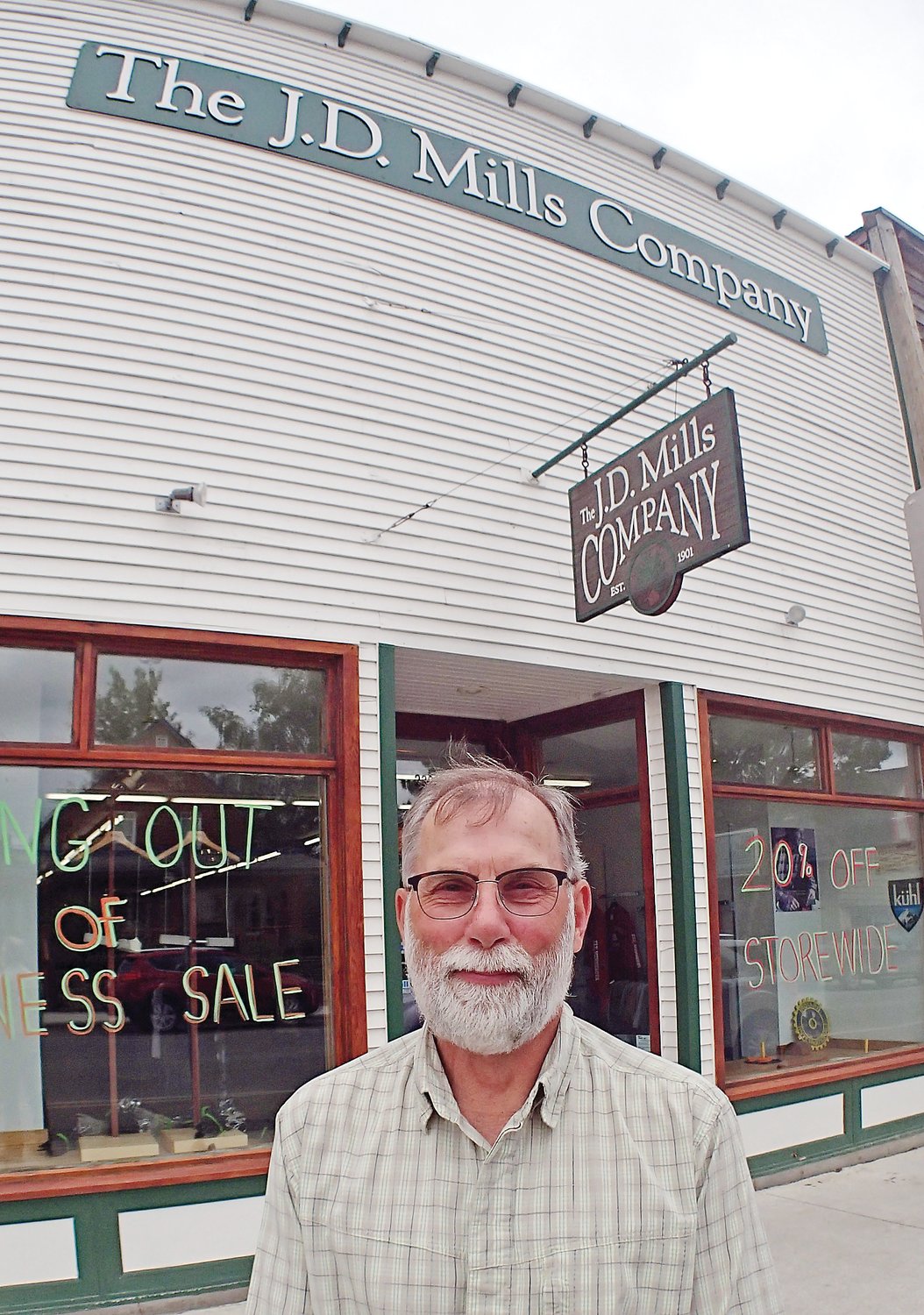 John Mills is the fourth owner of the 120-year-old Ely clothing business. The store will close by the end of July.