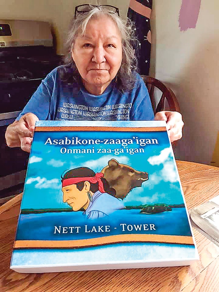 Bois Forte elder Karen Drift displays one of three games she has created to teach the Ojibwe language.