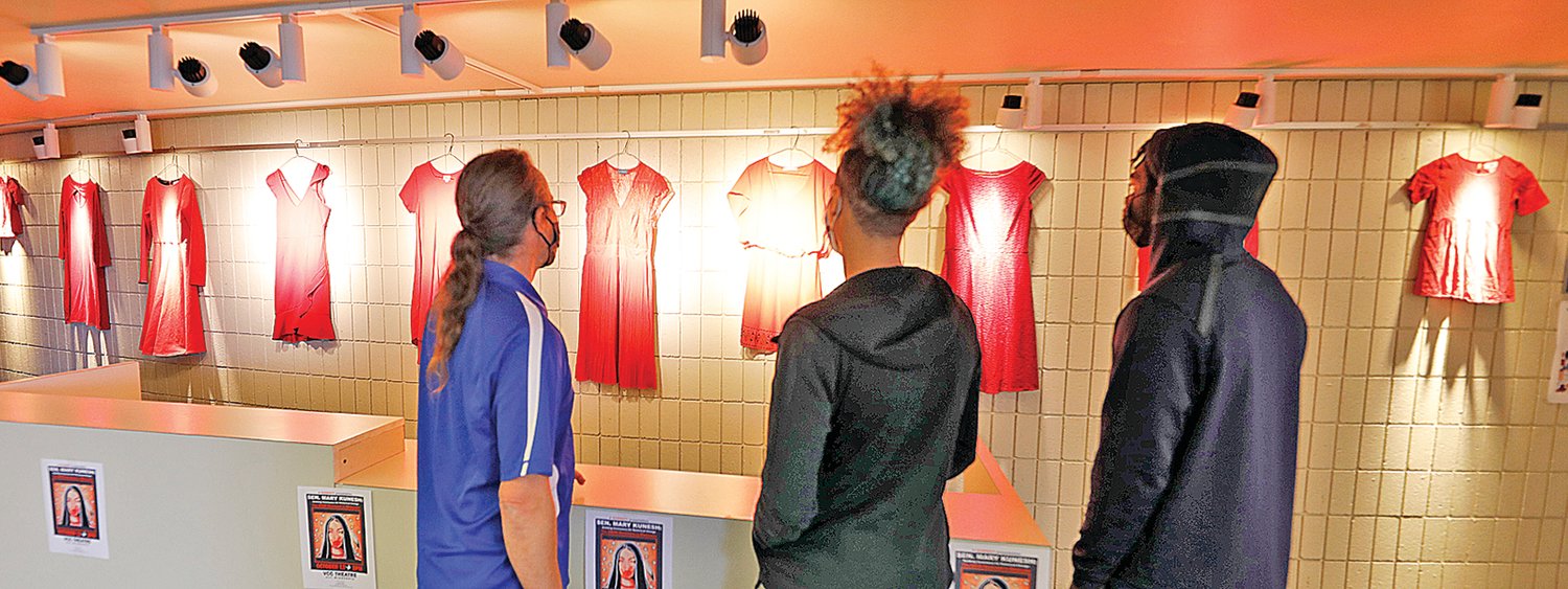 Red dresses were displayed outside the Vermilion Community College Fine Arts Theater.