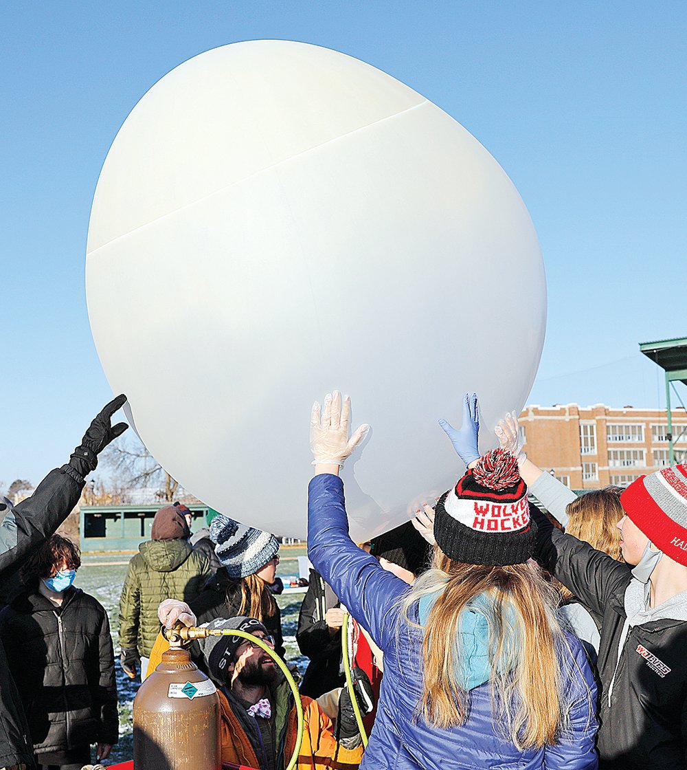 Ely eighth-grade science students gathered on the baseball field last Thursday to launch Timberwolves 4, a weather balloon experiment.