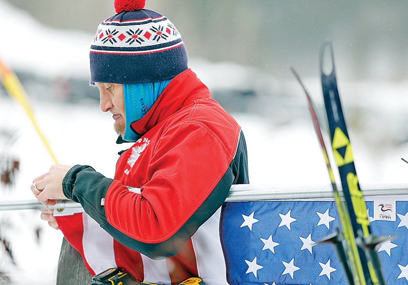 Carl Skustad prepared a new American flag for the opening ceremony.