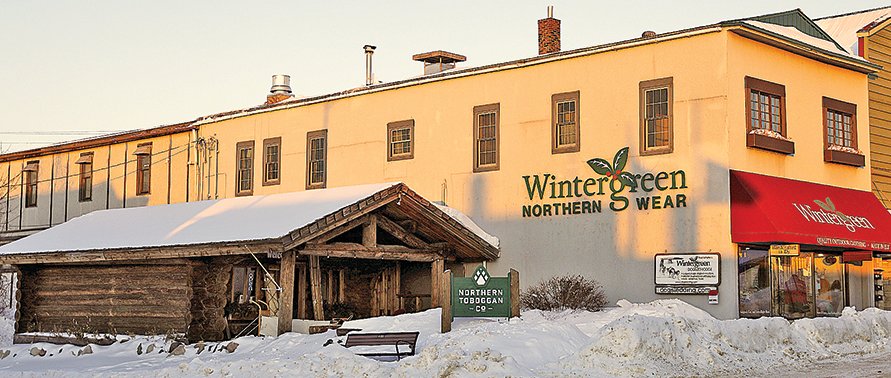 Northern Toboggan Co. is located next to Wintergreen Northern Wear in Ely.