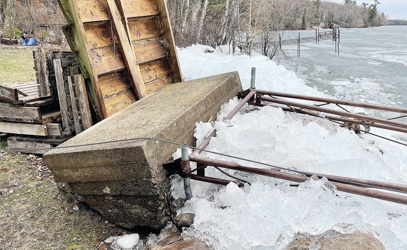 Highs winds Monday blew ice slabs on shore at Lake Vermilion’s Birch Point, damaging docks.