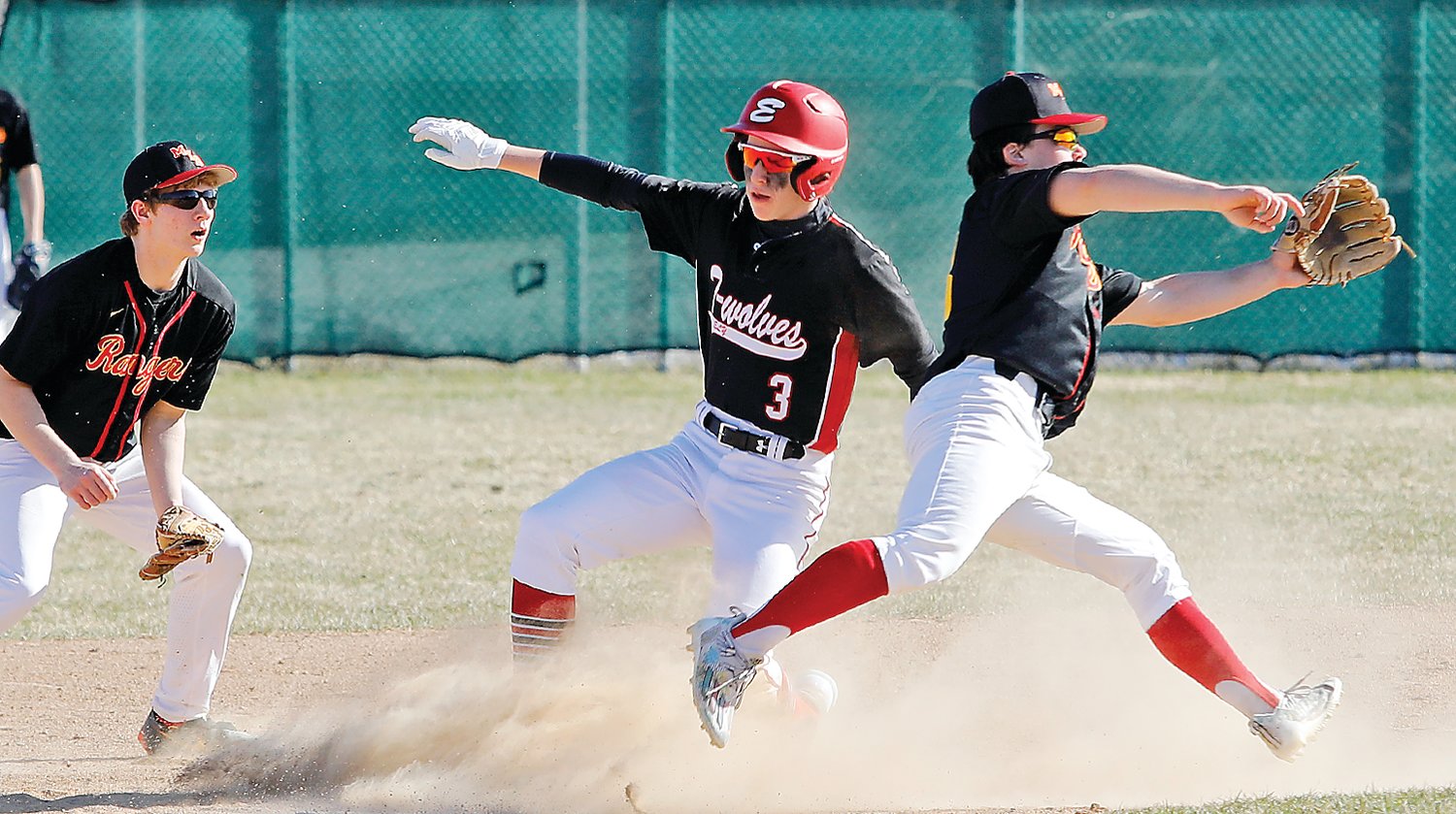 Ely’s Joey Bianco starts to slide into second base during a successful steal attempt against MI-B 
last Thursday.
