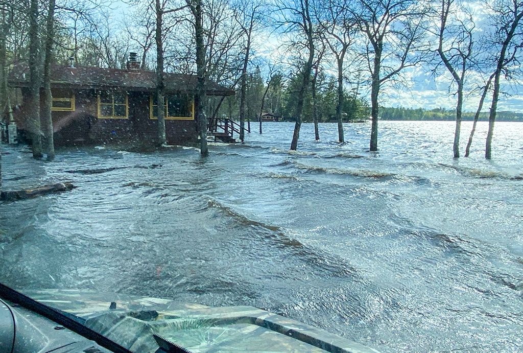 Flood waters that have already exceeded 2014 levels, like these at Crane Lake, are expected to continue rising at least through next Wednesday, in some places approaching all-time record highs.