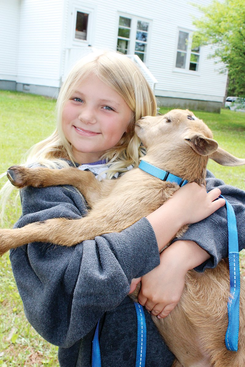 Savannah 
Johnson got some 
cuddle time in with the baby goats.