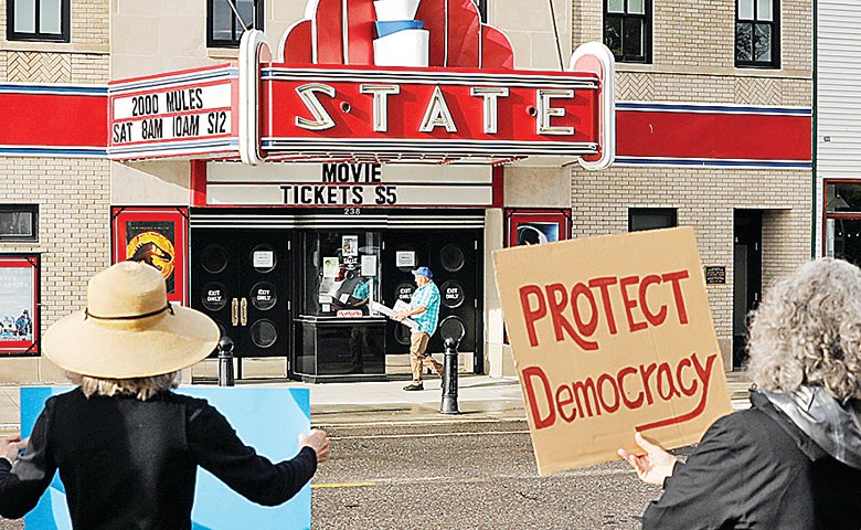 Protestors gathered outside of Ely’s Historic State Theater Saturday morning as the city’s mayor, Roger Skraba, candidate for the Minnesota House 3A seat, made his way inside to view the controversial political film, “2000 Mules.”