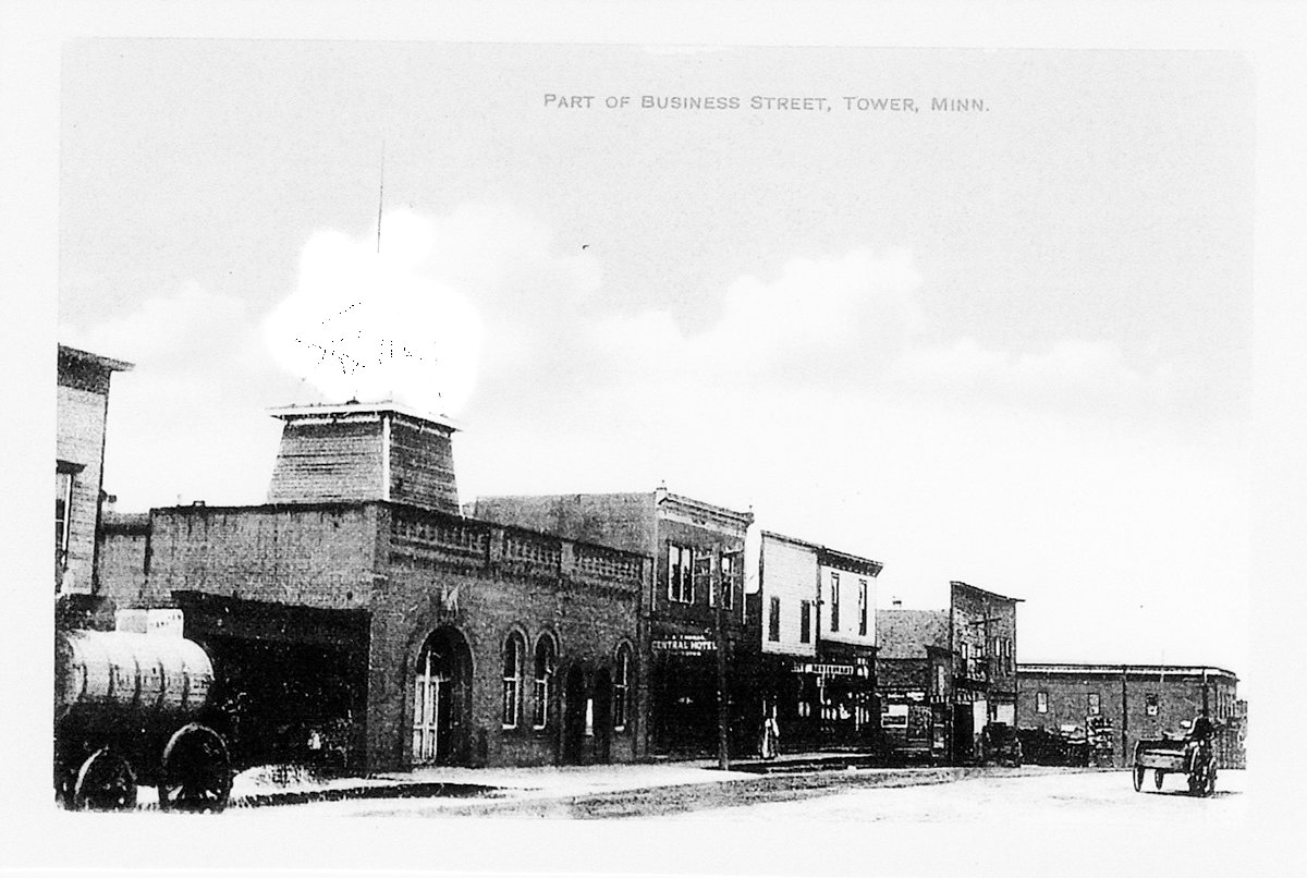 Postcard of Tower Main St. showing the Historic Fire Hall.