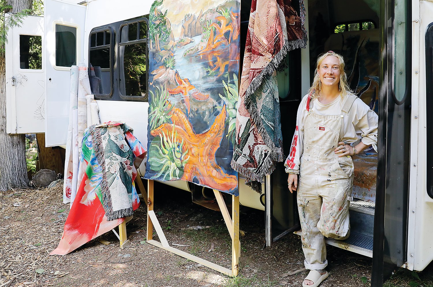 Leah Reusch outside of her studio, created from a renovated old passenger bus.