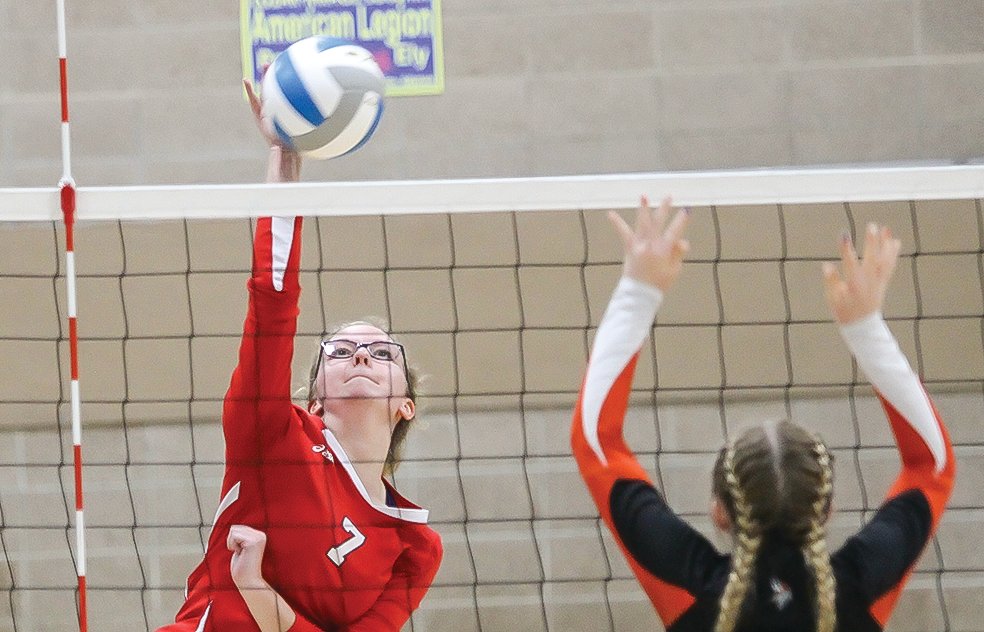Senior Audrey Thomas goes up high for a kill during Tuesday’s contest with Littlefork-Big Falls.