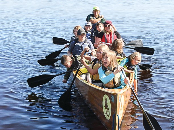 Students from Tower-Soudan and Northeast Range were 
all smiles as they learned to canoe last Friday on Lake Vermilion.