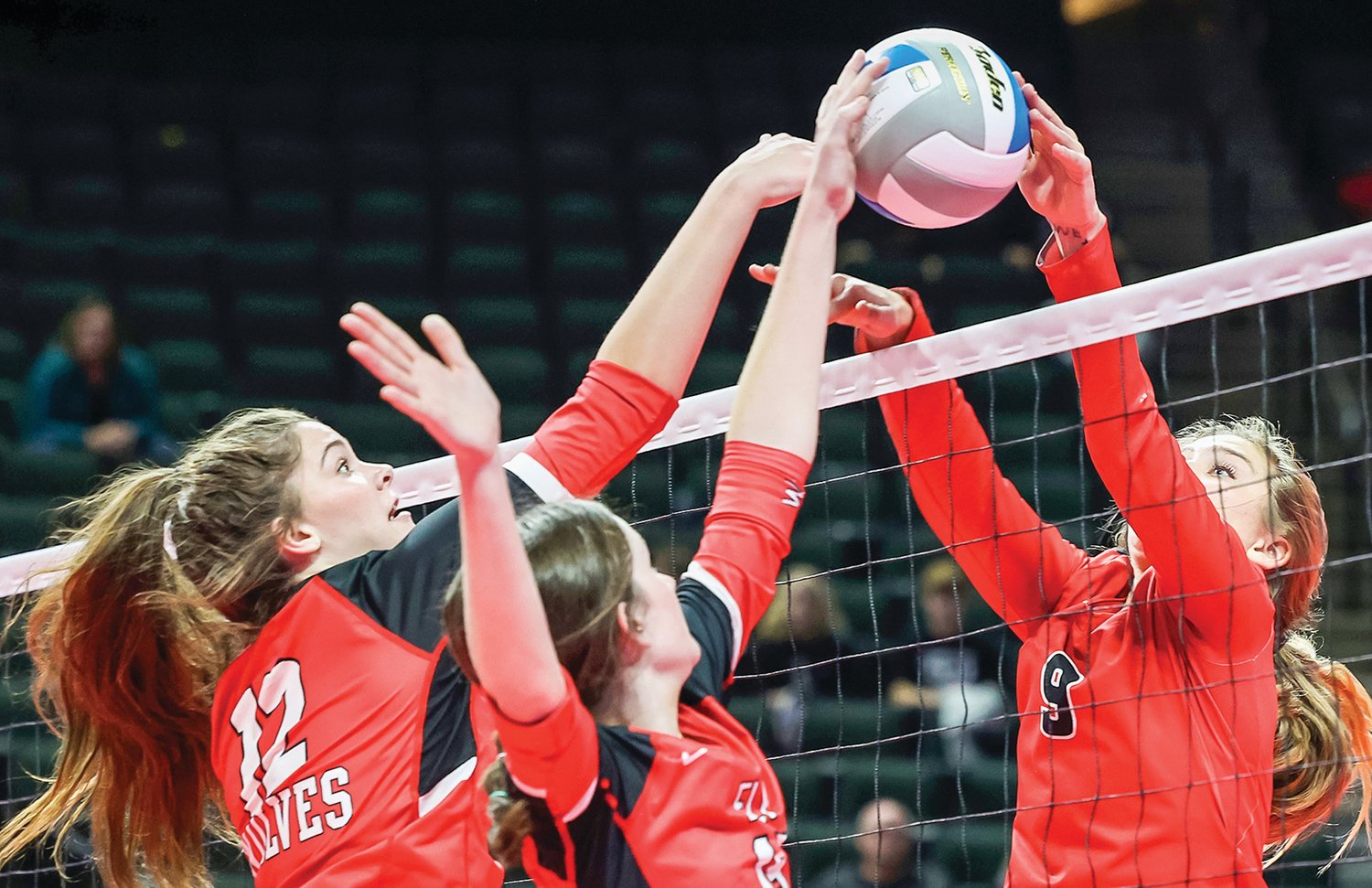 Ely’s Lily Rechichi and Madeline Kallberg 
battle for control of the ball against Mayer Lutheran in the opening round of the state volleyball tournament, held last 
weekend in 
the Twin Cities.