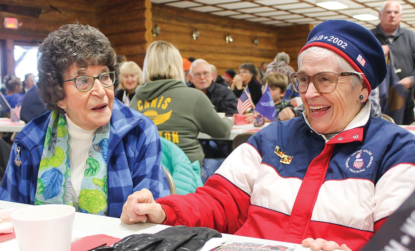 Longtime friends Adeline Broten, of Tower, and Corrine Schedlbauer, of Babbitt, enjoy each other’s company during the monthly pancake breakfast put on by the Embarrass Fair Board.