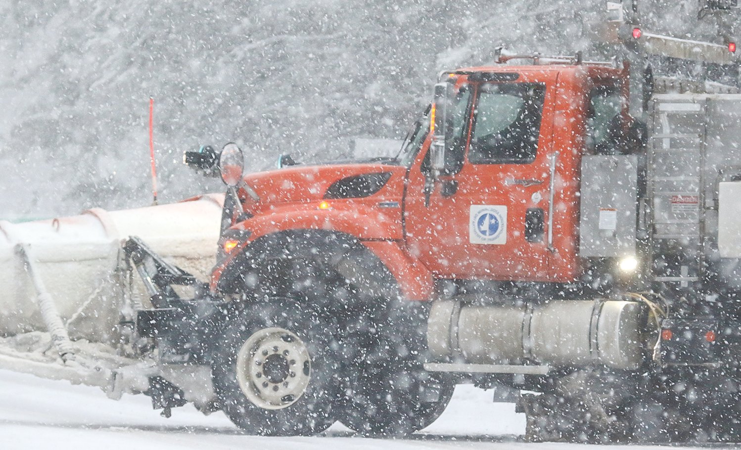 A MnDOT 
snowplow was out working Hwy. 169 in heavy snow on Wednesday.