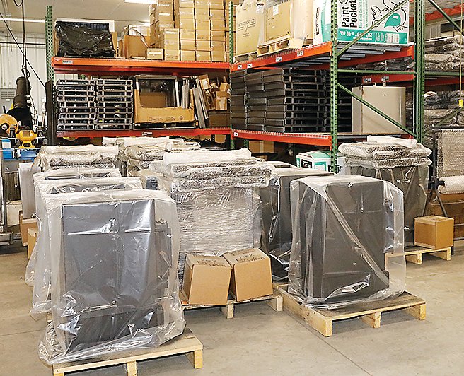 Sauna stoves wrapped in preparation for shipping at Lamppa Manufacturing. The company was able to sell its high quality sauna stoves through the past several months, since they weren’t subject to the same 
certification process as their wood furnaces.