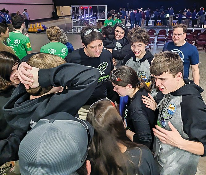 The team reacts with excitement as they learn the results of the recent competition held in Duluth. The team will compete in Illinois this weekend and are invited to the world championship in Texas set for later this year.