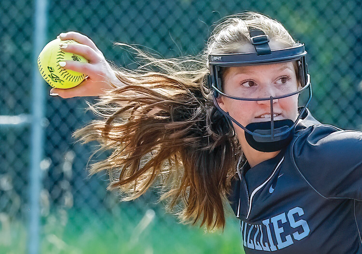 Grizzlies’ third baseman Helen Koch eyes first as she fielded a hot grounder during playoff competition on Tuesday.