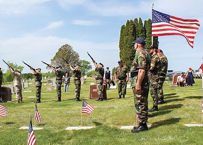 Ely Area Honor Guard gives the salute to the honored dead.