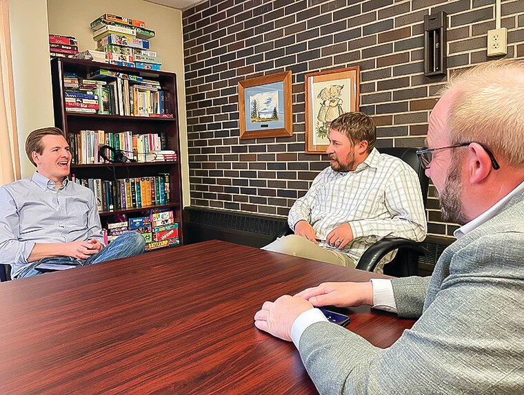 Sen. Grant Hauschild (l) and Rep. Roger Skraba (r) talk with BWCC director Adam Masloski about the recently completed legislative session.