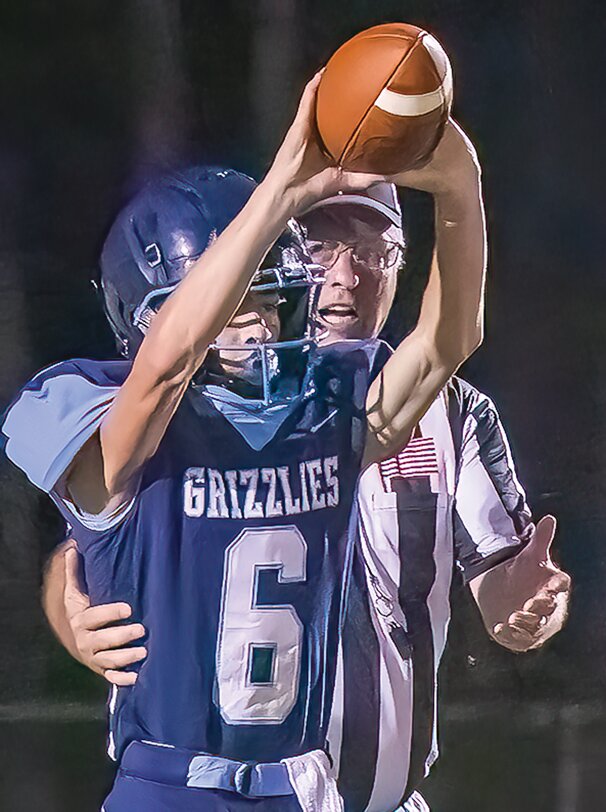The Grizzlies’ Trajen Barto celebrates one of his game-high four interceptions.