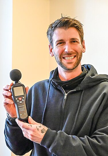 City of Ely employee David Huberty with Ely’s new sound measurement meter. The city bought the meter and the equipment to 
calibrate it in July to respond to public complaints that the 
compressors at Zup’s 
grocery store were too loud.