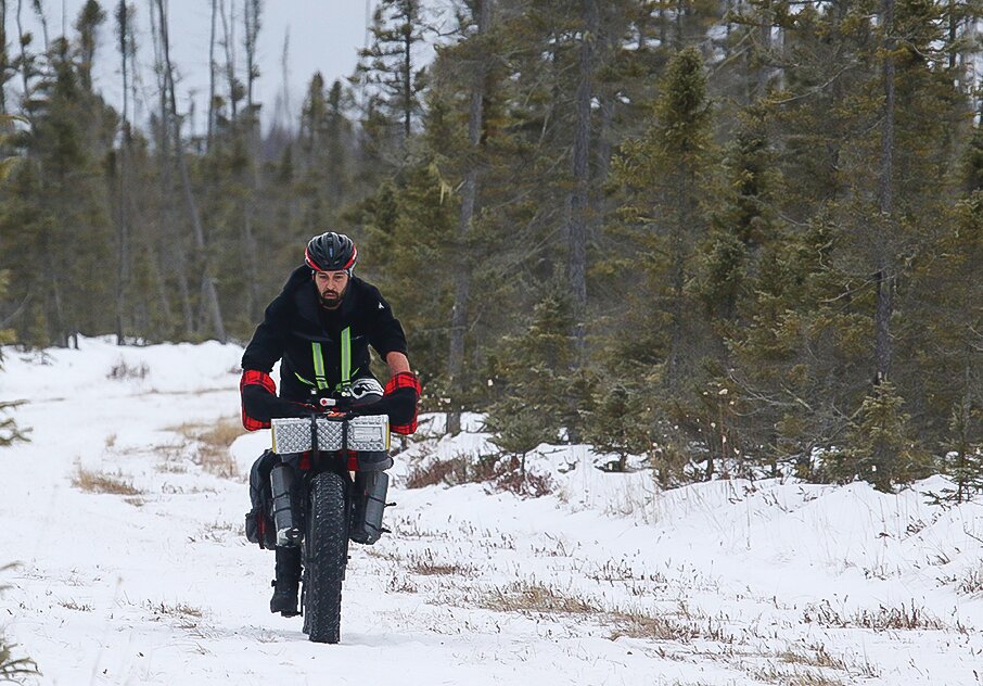 Andy Weinzierl, of Duluth, pedals his way  through the Lost Lake Swamp along the final two miles of the Arrowhead 135 course