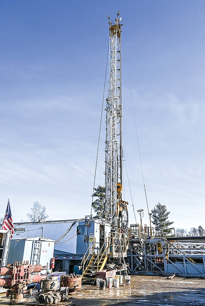 Capstar 
Drilling 
employees assembling the backflow preventer for installation on the drill rig near Babbitt.