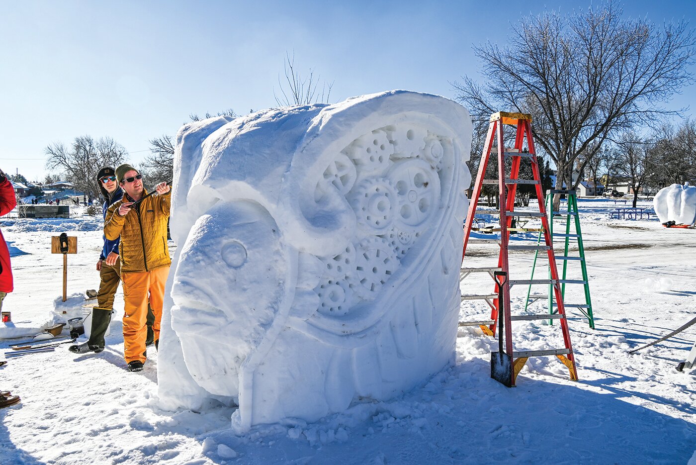 Ely area locals Chris Koivisto (right) and Oskar Koivisto (left) working on their “Lentava Suomalainen” (“Flying Finn”) 
sculpture.